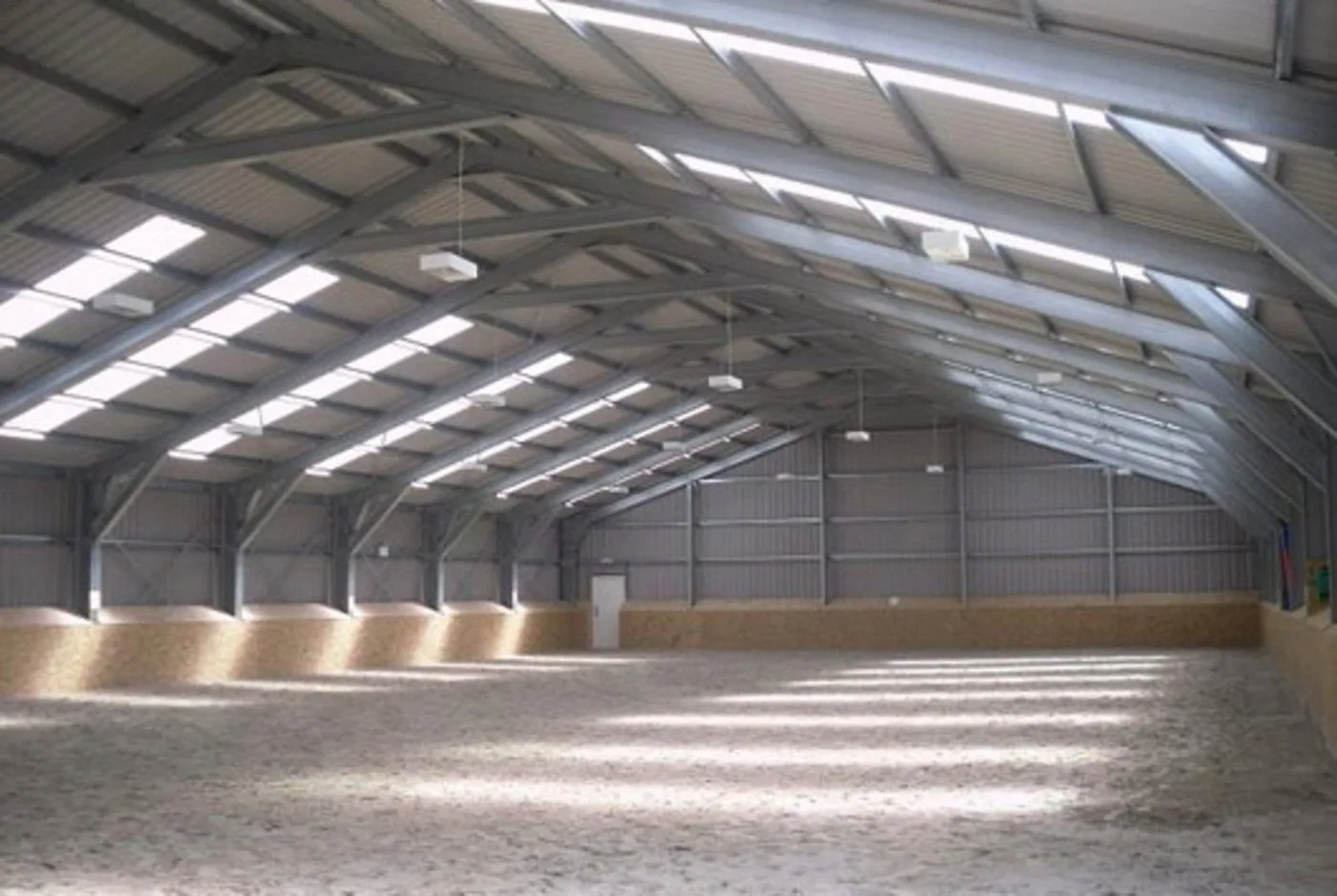 An agricultural equestrian steel framed building designed and supplied by Springfield Steel Buildings for a riding arena.