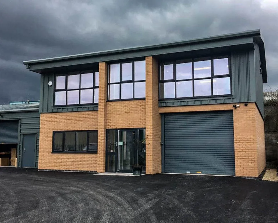 Large steel building with brick front