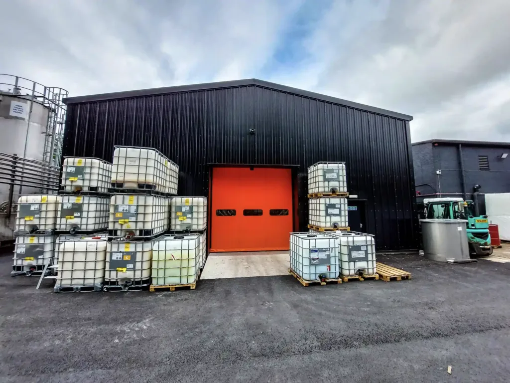 new morrells storage building with orange door