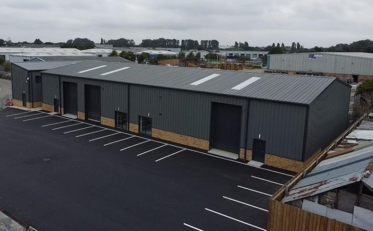 Large Steel Frame industrial Unit in Hull with brick plinth to front and glazed